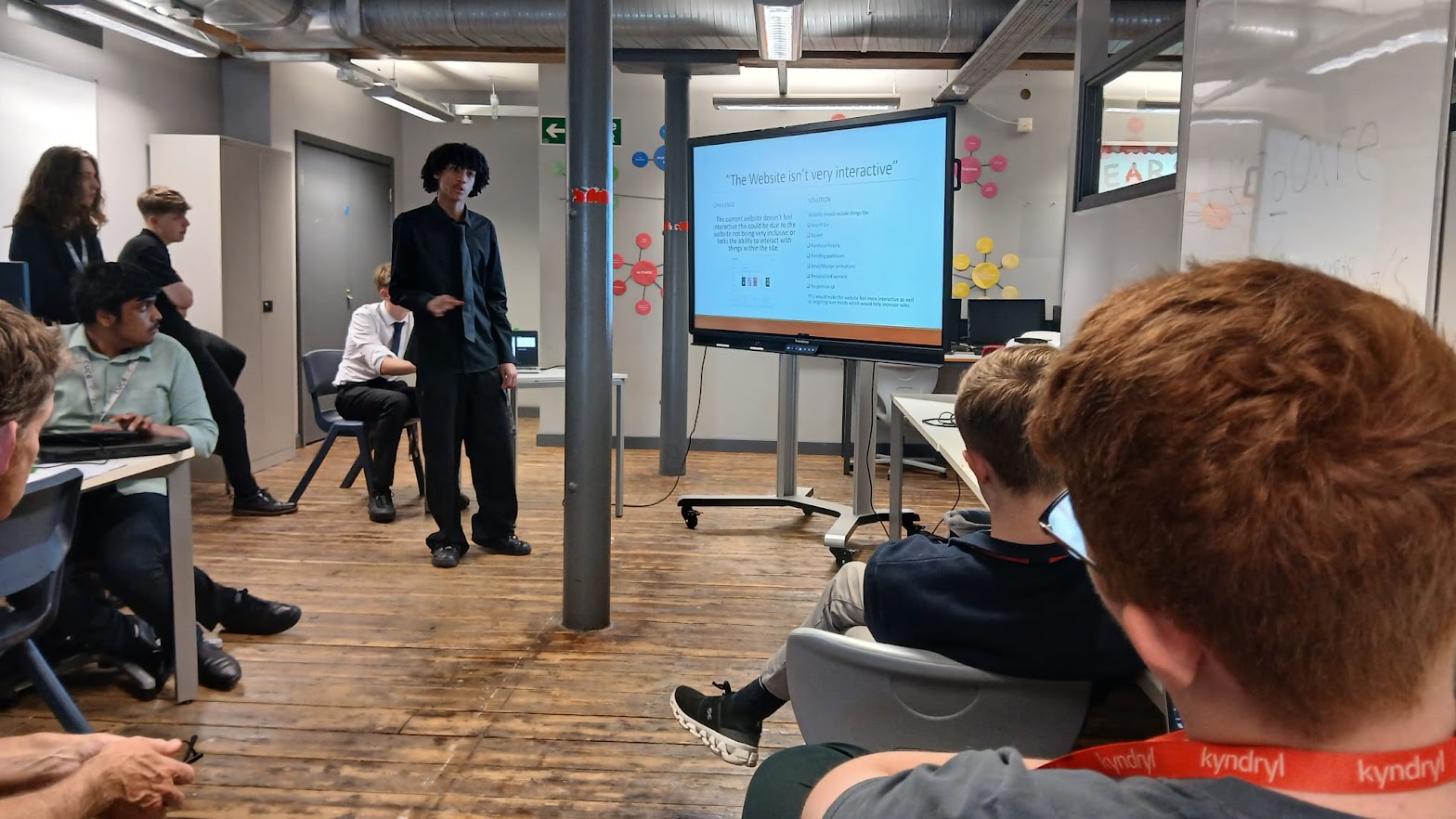 Sixth form students presenting to Kyndryl, world’s leading technology services companies