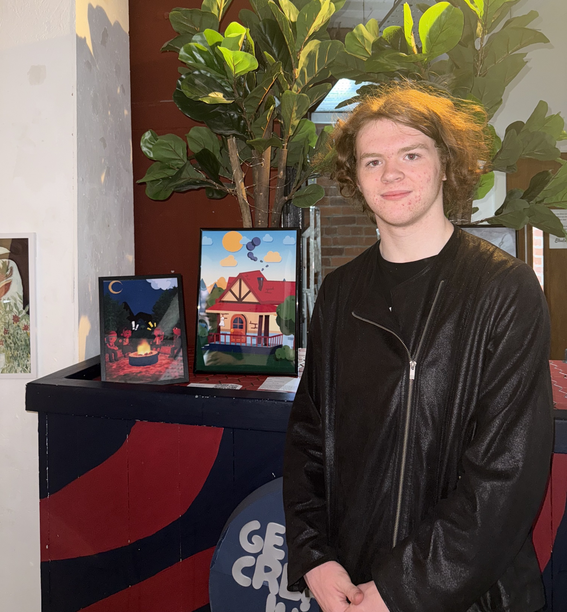 Student in front of the exhibition